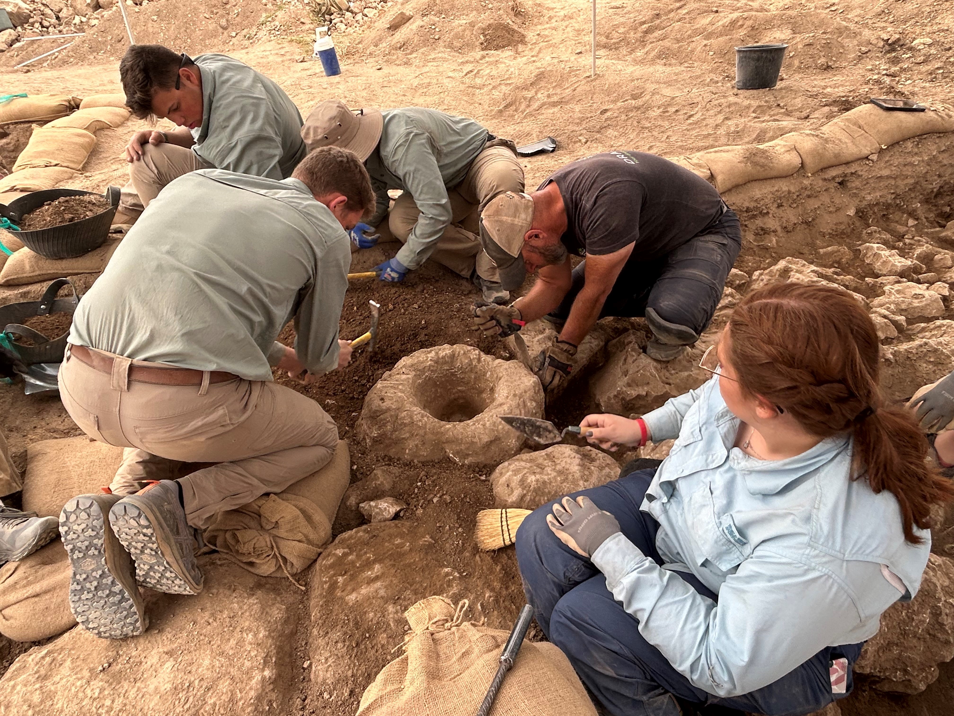 College Students Uncovering a Socket Stone at Shiloh